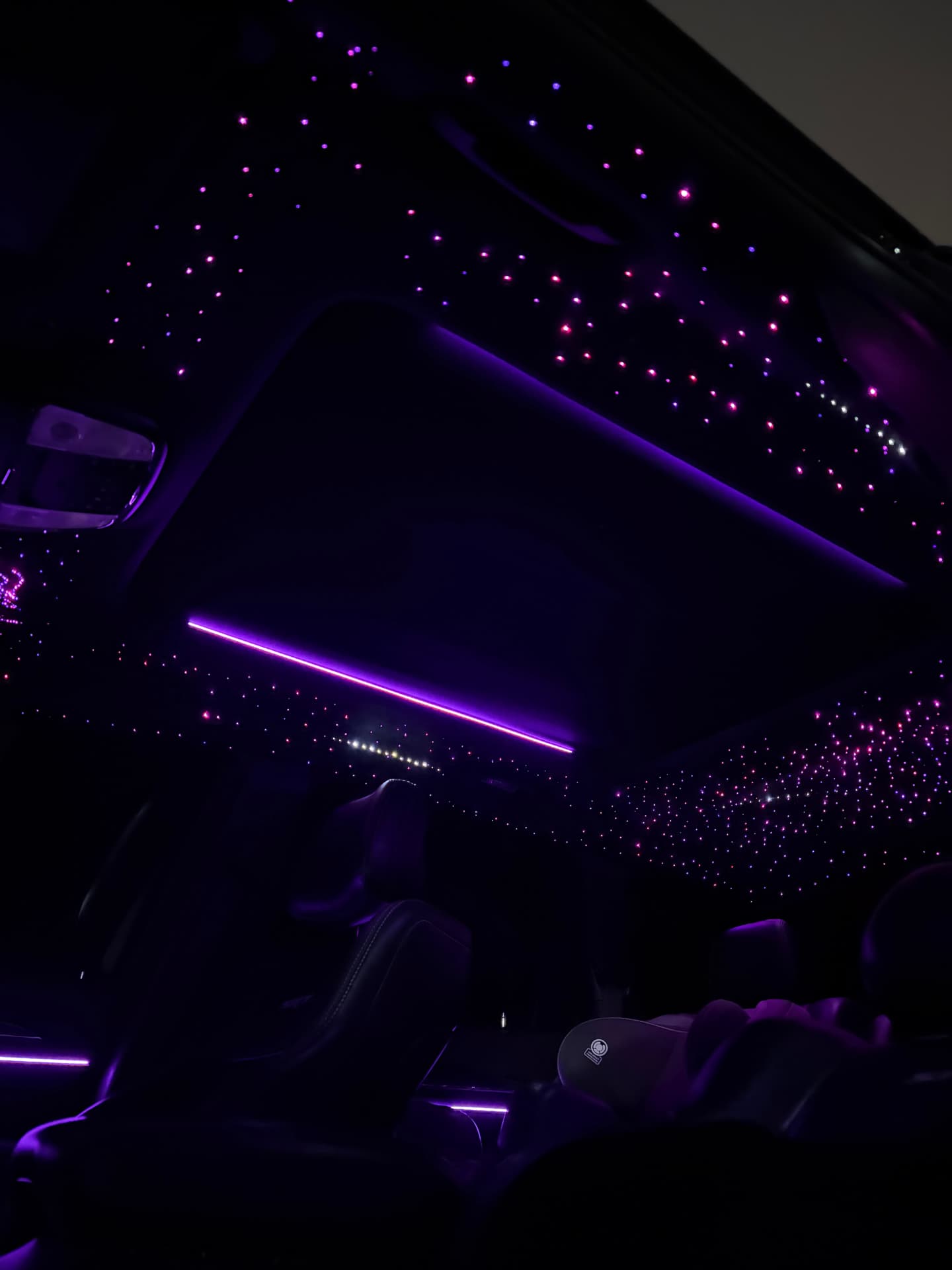 Purple starlight ceiling with light bar accents